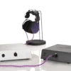 Valencia show in both black and natural aluminum finishes with headphones in the background